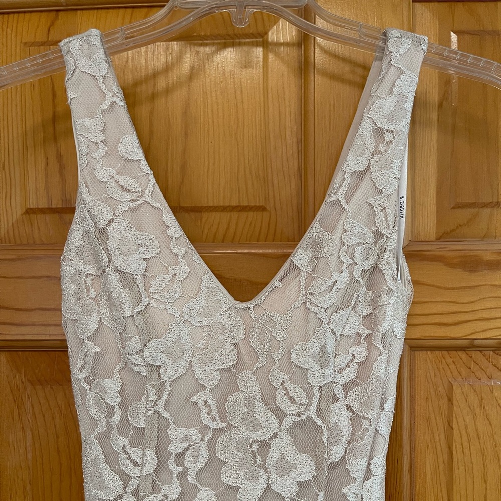 Gold Sleeveless/backless long formal dress, purchased at Dillard’s. Size 7/8.